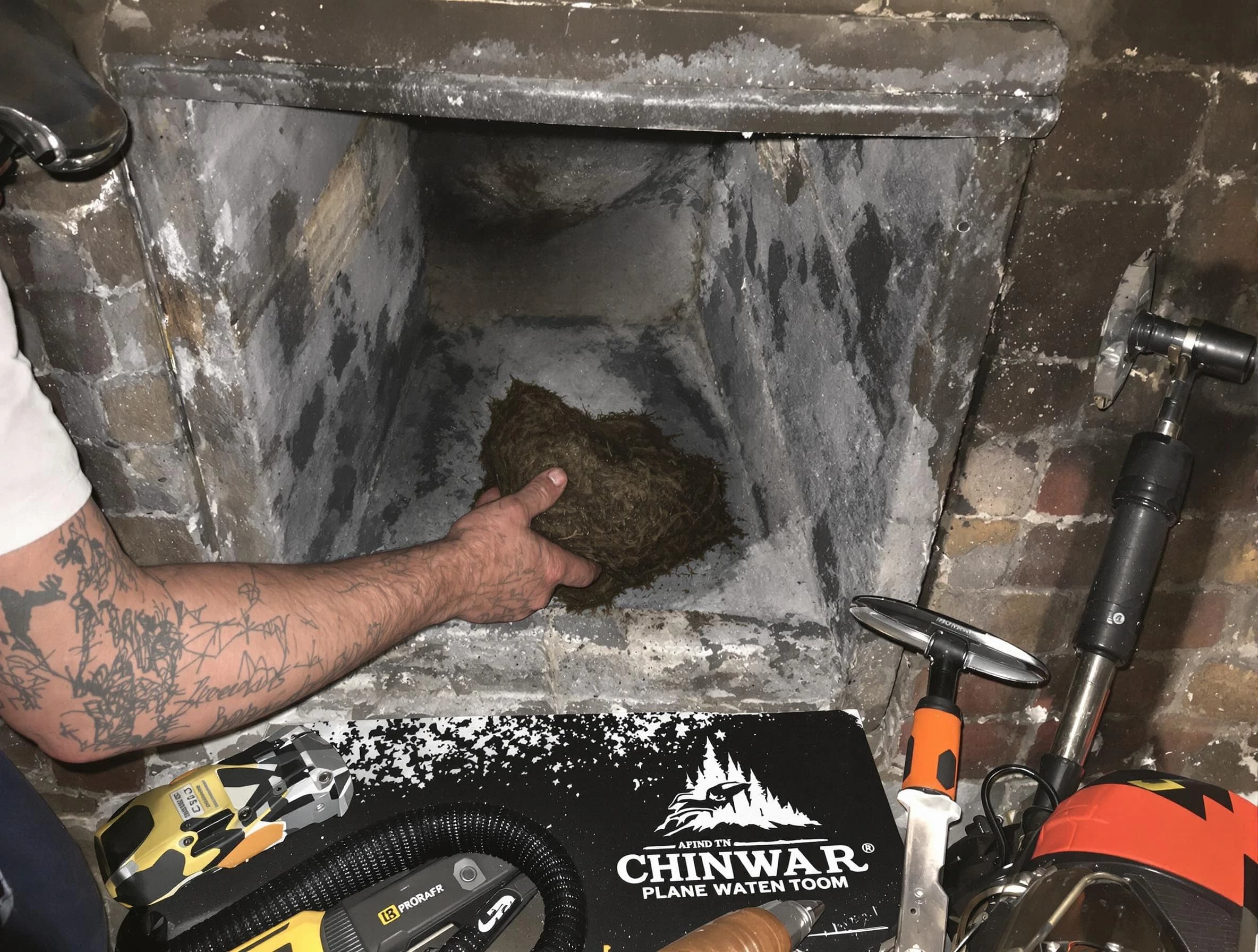 Arvada Chimney Sweep safely removing debris and screening chimney in Arvada, CO
